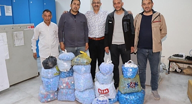 Oltu Kadastro personeli binlerce mavi kapak topladı
