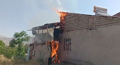 Metruk binada çıkan yangın evlere sıçradı