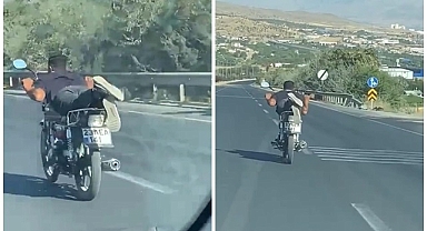 Canını hiçe saydı, motosikleti yatarak sürdü: O anlar kamerada