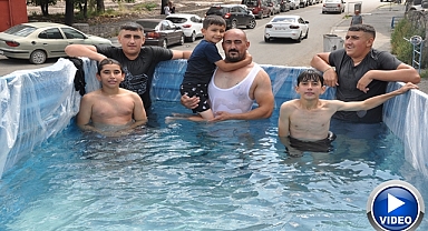 Kamyonet kasasında 'mobil havuz' keyfi