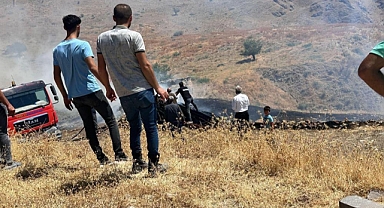 Sigara izmariti yaktı, görenler yardıma koştu!