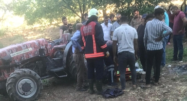 Traktörün arasında kalarak can verdi