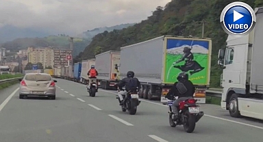 Motosiklet üzerinde tehlikeli yolculuk