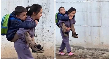 Vefakar abla kardeşini sırtında taşıdı!