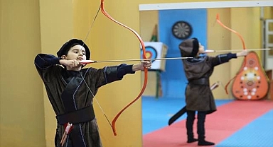 Okulun bodrumunda geleceğin sporcularını yetiştiriyor