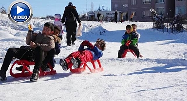 Kızağını alan kaymaya koştu