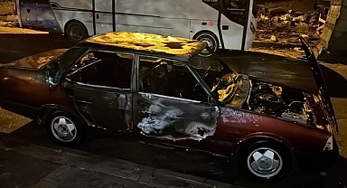 Yanan otomobilden canını zor kurtardı!