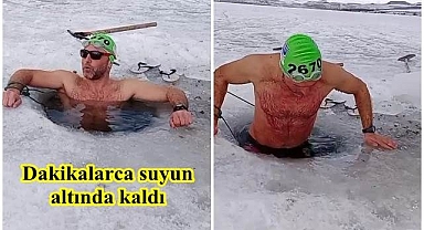 Buz tutmuş göle girdi