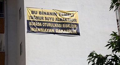 Son çare binaya pankart astı
