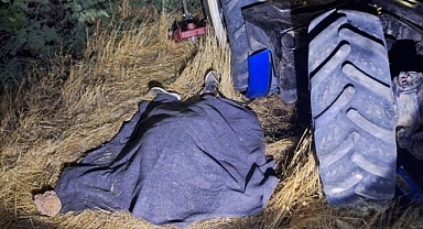 Devrilen traktörün altında can verdi!