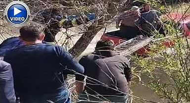 Aracıyla dereye uçan sürücü kurtarıldı