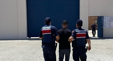 Aranan şahıs yakayı ele verdi
