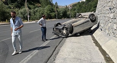 Takla atan otomobilden sağ çıktı