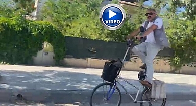 İlginç bisikletiyle caddede tur attı