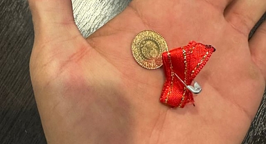 Bulduğu çeyrek altını polise teslim etti