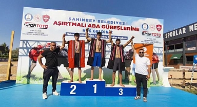 Sporcular madalyalarla döndü