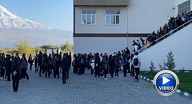 Eli sopalı şahıslar okul bastı