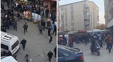 Husumetli aileler sokak ortasında birbirine girdi!