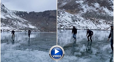 Buz tutan gölde doyasıya eğlendiler