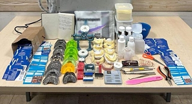 Evini kliniğe dönüştüren sahte dişçiye suçüstü!