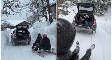 Geleneksel tahta kızaklarla kış eğlencesi