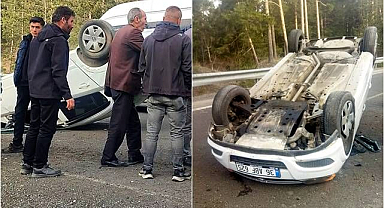 Bariyere çarparak ters döndü