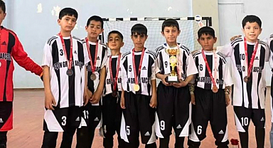 Minik şampiyonlara coşkulu karşılama