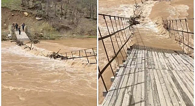Nehri taştı, asma köprü çöktü