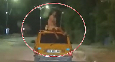 Aracın tavanında tehlikeli yolculuk