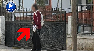 Elinde silahla okula gelen öğrenci böyle görüntülendi